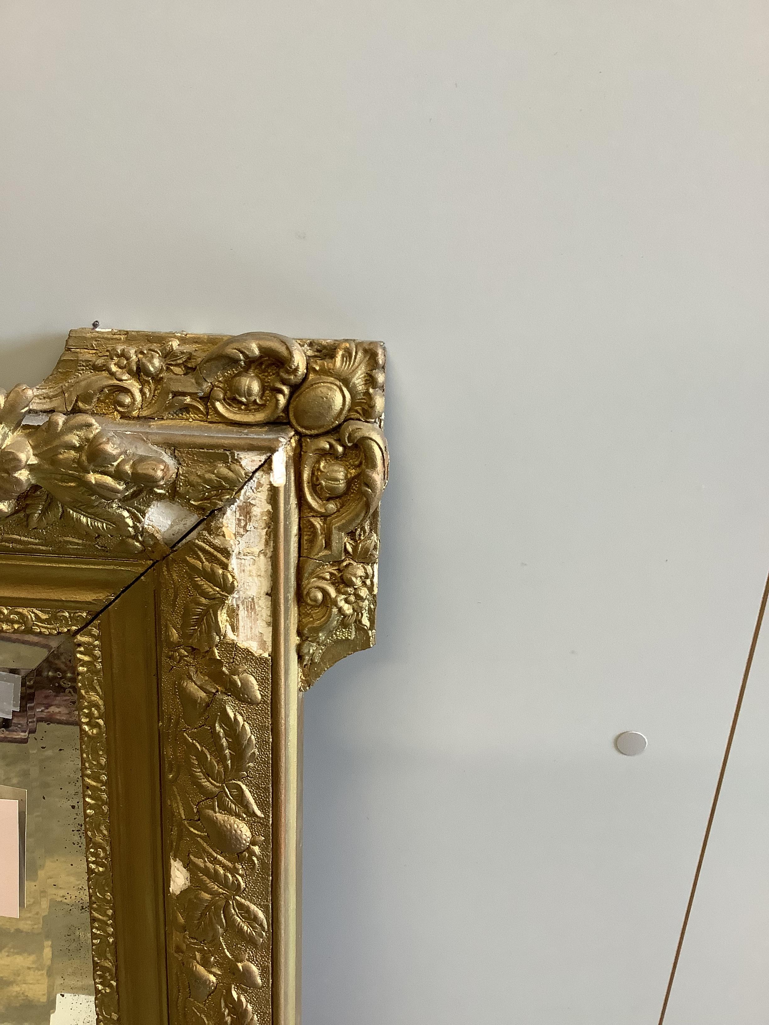 A late 19th century French giltwood and composition wall mirror, re-painted, width 81cm, height 122cm